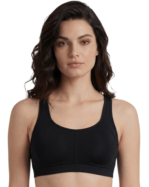 Black padded racerback sports bra with removable cups, front view on a model